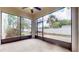 View from the screened-in porch, looking into the backyard at 3615 S Church Ave, Tampa, FL 33629