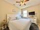 Relaxing bedroom features a comfortable queen-size bed and serene decor at 408 Delwood Breck St, Ruskin, FL 33570