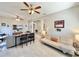 Open living room with neutral tones, recessed lighting, ceiling fan and modern furniture at 408 Delwood Breck St, Ruskin, FL 33570