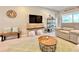 Cozy living room with modern entertainment center and neutral decor at 408 Delwood Breck St, Ruskin, FL 33570