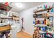 Functional pantry space with open shelving for organized storage at 4116 W Watrous Ave, Tampa, FL 33629