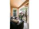 Relaxing outdoor balcony with comfortable seating and a view of lush tropical landscaping at 4221 W Spruce St # 2422, Tampa, FL 33607