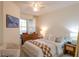 Cozy bedroom features soft lighting, comfortable bedding, and stylish furnishings at 4221 W Spruce St # 2422, Tampa, FL 33607