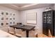 Formal dining area features a large table, elegant seating, and curated artwork at 4221 W Spruce St # 2422, Tampa, FL 33607