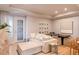 Bright living room featuring hardwood floors, recessed lighting, and a comfortable couch and dining area at 4221 W Spruce St # 2422, Tampa, FL 33607