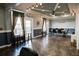 Spacious meeting room with ample seating and natural light, perfect for gatherings and discussions at 4221 W Spruce St # 2422, Tampa, FL 33607