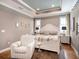 Inviting main bedroom with white furniture, stylish decor, and lots of natural light at 4689 Wandering Way, Wesley Chapel, FL 33544
