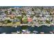 Picturesque aerial view of waterfront community with private boat docks at 4920 Pelican Dr, New Port Richey, FL 34652