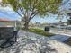 Backyard view of patio with outdoor furniture, boat dock, and canal access at 4920 Pelican Dr, New Port Richey, FL 34652