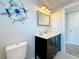 This bathroom features a coastal design with a vanity, nautical accents, and stylish hardware at 4920 Pelican Dr, New Port Richey, FL 34652