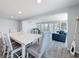 Dining table located in an open concept area that features waterfront views at 4920 Pelican Dr, New Port Richey, FL 34652