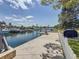 Private dock with boat lift offering convenient access to the waterfront at 4920 Pelican Dr, New Port Richey, FL 34652