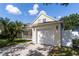 Charming home with a garage and a quaint front porch perfect for relaxing outdoors at 5607 Tanagergrove Way, Lithia, FL 33547