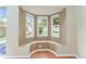 Bright window seat area overlooking the backyard, great for reading and relaxation at 5607 Tanagergrove Way, Lithia, FL 33547