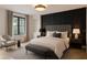 Bedroom with a window, closet and hardwood floors at 5818 Cruiser Way, Tampa, FL 33615