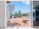 Waterfront deck featuring a spiral staircase and seating with views of the water at 5818 Cruiser Way, Tampa, FL 33615