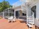Exterior deck with spiral staircase access, offering views of the pool and waterfront at 5818 Cruiser Way, Tampa, FL 33615