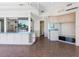 Large living area with custom cabinetry and waterfront views at 5818 Cruiser Way, Tampa, FL 33615