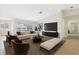 Comfortable living room featuring modern furnishings, natural light, and backyard views at 5818 Cruiser Way, Tampa, FL 33615