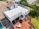 Rooftop deck with spiral staircase, patio furniture, and stunning views of the surrounding waterfront at 5818 Cruiser Way, Tampa, FL 33615