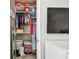 Organized walk-in closet provides ample storage space, shelving, and hanging areas at 612 Ozona Village Dr, Palm Harbor, FL 34683