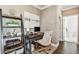 Home office featuring a desk, chair, ladder shelf, and decor in a cozy and functional space at 612 Ozona Village Dr, Palm Harbor, FL 34683