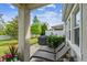 Relaxing outdoor patio with lounge chairs and a grill, perfect for entertaining at 612 Ozona Village Dr, Palm Harbor, FL 34683