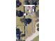 Overhead view of the house highlighting the lot and driveway, within a green landscaped community at 620 Lithia Pinecrest Rd, Brandon, FL 33511