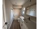 Clean bathroom featuring a single sink, a tub-shower combo and a large mirror at 620 Lithia Pinecrest Rd, Brandon, FL 33511