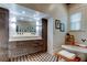 Bathroom showcasing a modern vanity, soaking tub, and elegant fixtures creating a spa-like ambiance at 6341 Discovery Ln, Land O Lakes, FL 34638