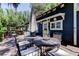 Outdoor dining and gazebo on deck with access to the home's side entrance at 6341 Discovery Ln, Land O Lakes, FL 34638