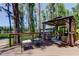 Cozy gazebo features comfortable seating, perfect for enjoying the outdoors at 6341 Discovery Ln, Land O Lakes, FL 34638