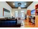 Well-lit living area featuring hardwood floors, stylish furnishings, and plenty of natural light at 6341 Discovery Ln, Land O Lakes, FL 34638