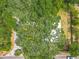 The house has lots of trees surrounding it creating a relaxing and shaded environment at 6901 N 19Th St, Tampa, FL 33610