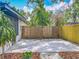 Side patio with wooden privacy fence at 6901 N 19Th St, Tampa, FL 33610