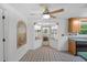 Cozy breakfast nook with natural light, decorative wall art, and access to the outdoors at 7095 South St, Webster, FL 33597