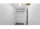 Walk-in closet with shelving, a rod for hanging, and a clean, organized space at 7095 South St, Webster, FL 33597