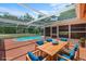 Enclosed patio area with a private pool, perfect for outdoor relaxation and entertaining at 7095 South St, Webster, FL 33597