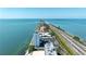 Gorgeous aerial view of waterfront property with Gulf views, private dock, and convenient highway access at 7200 Sunshine Skyway S Ln # 4B, St Petersburg, FL 33711