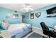 Relaxing bedroom with desk, television, and modern decor at 7200 Sunshine Skyway S Ln # 4B, St Petersburg, FL 33711