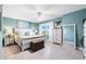 Comfortable bedroom with bright color and decor, featuring hardwood style floors at 7200 Sunshine Skyway S Ln # 4B, St Petersburg, FL 33711