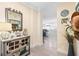 Entryway leading into the modern living space, with bright lighting and neutral decor at 7200 Sunshine Skyway S Ln # 4B, St Petersburg, FL 33711