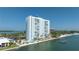 Waterfront condo building featuring a private pool, boat dock and stunning bay views at 7200 Sunshine Skyway S Ln # 4B, St Petersburg, FL 33711