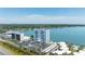 Scenic view of condo building with bay views, pool, and parking at 7200 Sunshine Skyway S Ln # 4B, St Petersburg, FL 33711