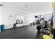 Community fitness center with modern exercise equipment, weights, and ample workout space at 7200 Sunshine Skyway S Ln # 4B, St Petersburg, FL 33711