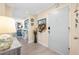 Entryway featuring stylish décor and a view into the home's bright, open living space at 7200 Sunshine Skyway S Ln # 4B, St Petersburg, FL 33711