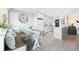 Cozy kitchen and dining nook with white cabinets and modern appliances at 7200 Sunshine Skyway S Ln # 4B, St Petersburg, FL 33711