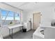 Well-lit laundry room equipped with washing machines and dryers, offering ocean views while doing laundry at 7200 Sunshine Skyway S Ln # 4B, St Petersburg, FL 33711