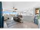 Open-concept living room featuring stylish decor, comfortable seating, and scenic views at 7200 Sunshine Skyway S Ln # 4B, St Petersburg, FL 33711