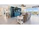 Comfortable living room with a cozy recliner, ample natural light, and scenic views at 7200 Sunshine Skyway S Ln # 4B, St Petersburg, FL 33711